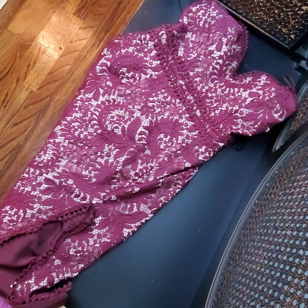 A red crimson lace dress